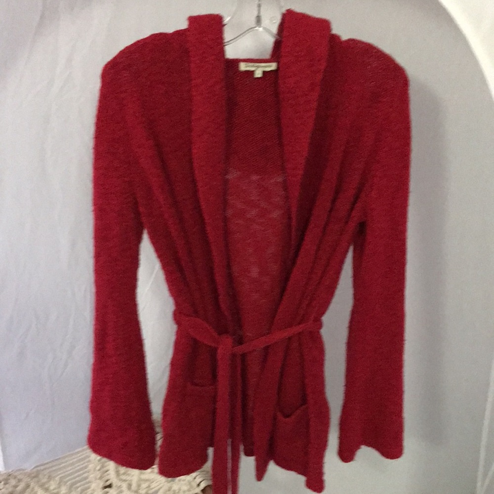 Soft cotton bell sleeved hooded sweater.